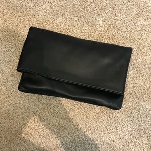 Simple yet beautiful black leather clutch.